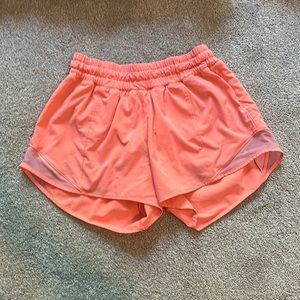 size 4 orange lulu lemon shorts